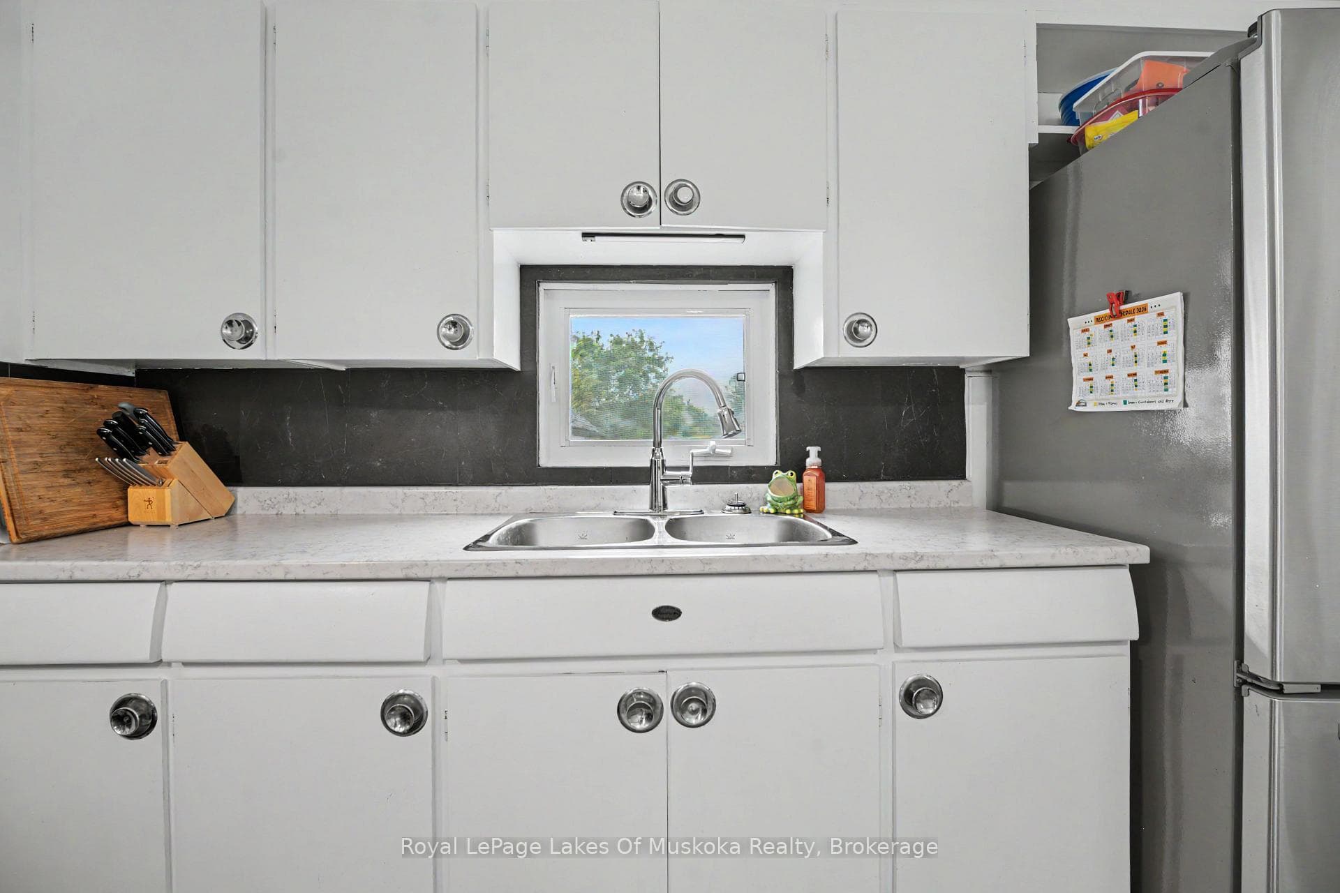 Kitchen, with walkout to the backyard