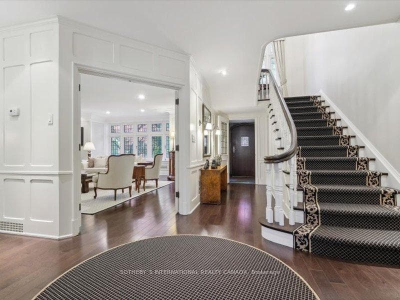 Centre Foyer Towards Living Room + Grand Staircase
