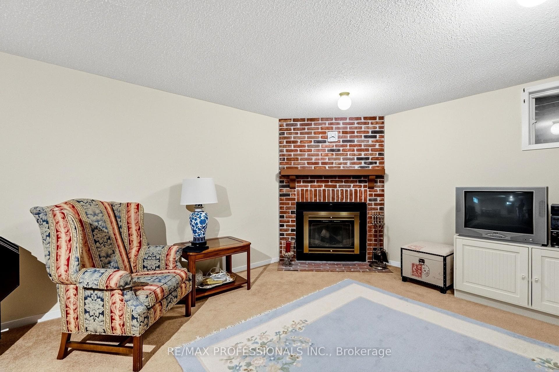 Basement Recreation Room with Wood Fireplace