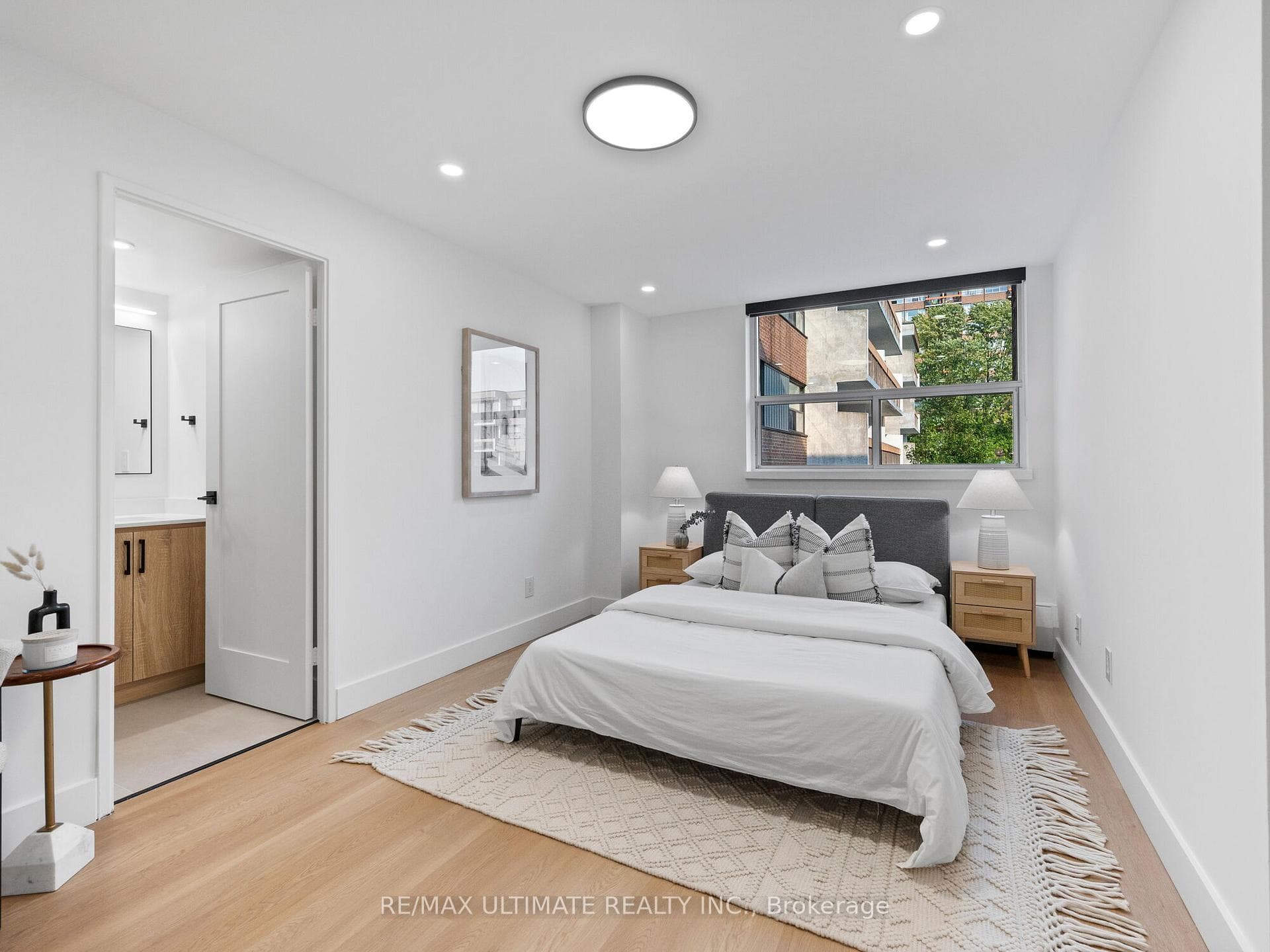 Primary Bedroom w/ Blackout Roller Shade