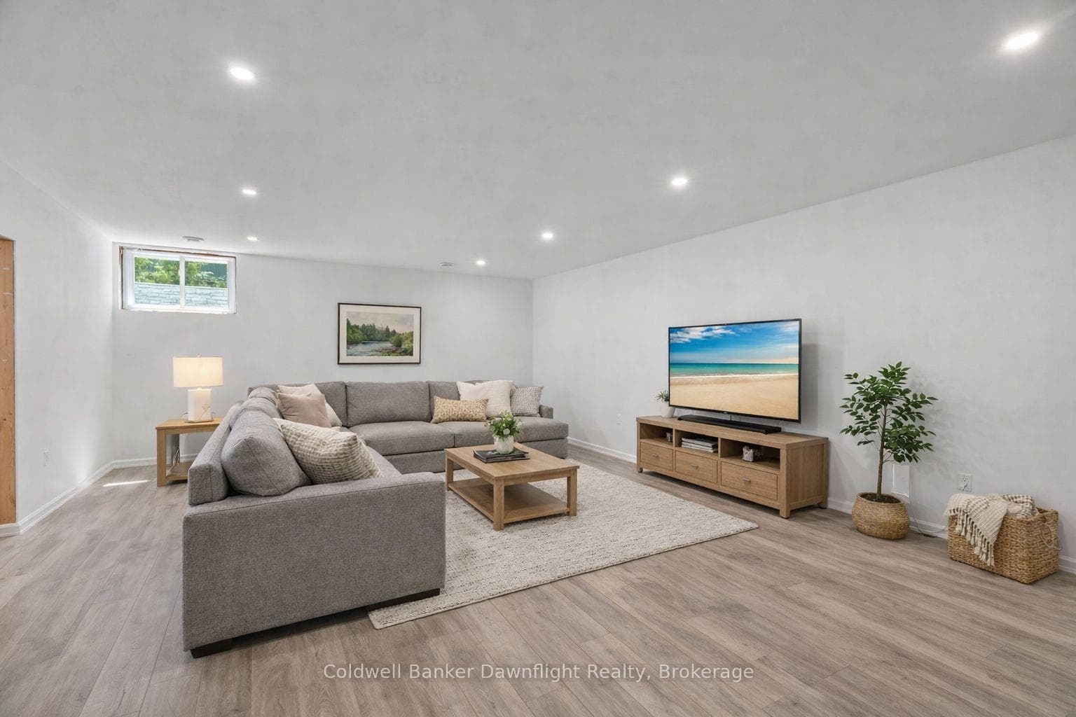 Virtually Staged Rec room in basement.
