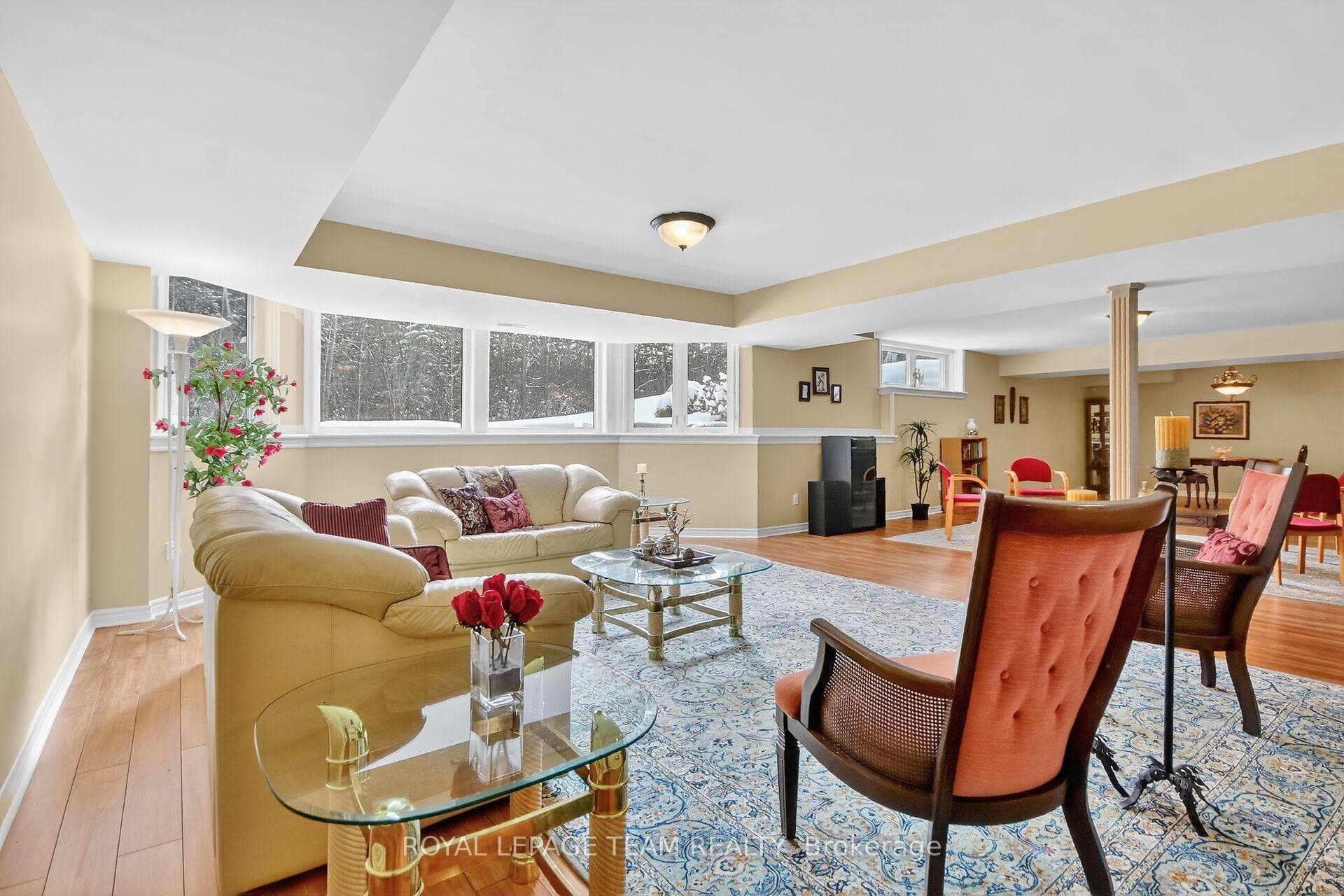 Massive recroom with large windows in lower level