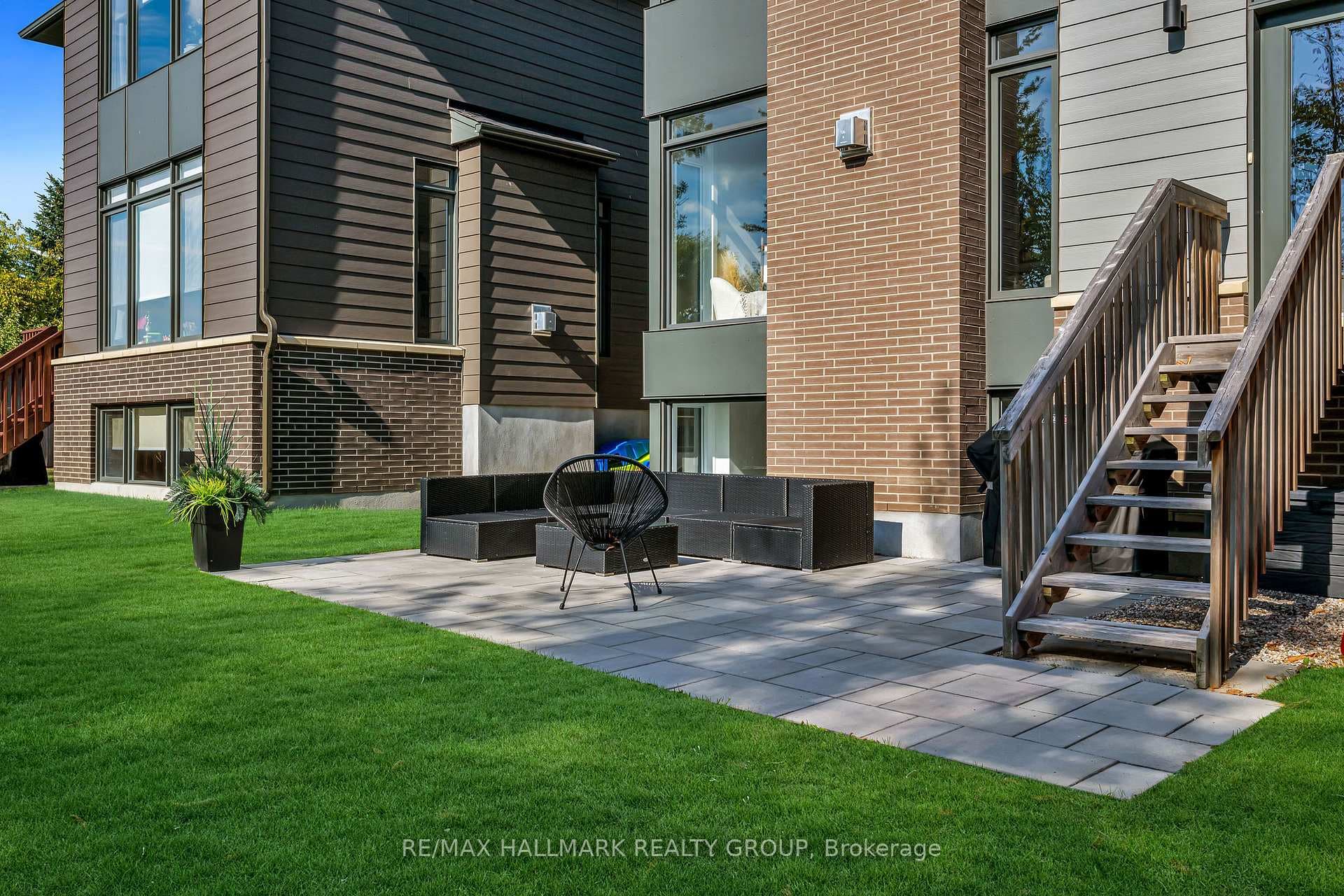 Rear patio and landscaped backyard