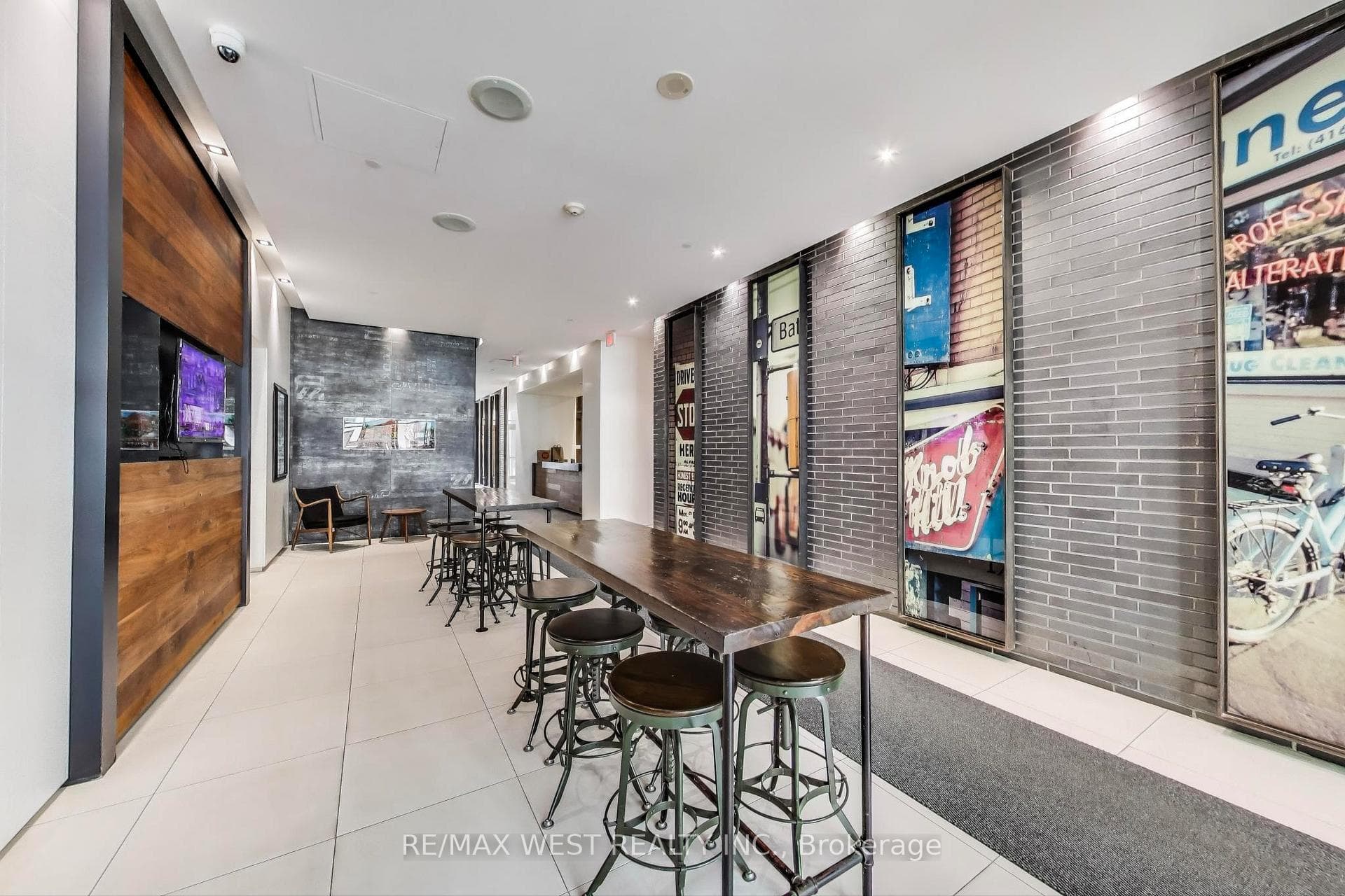 Lobby W/ Bar Seating On West Side Of Building
