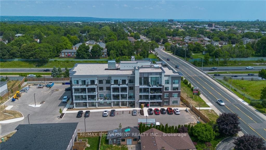 120 Springvalley Crescent Unit 303 photo 1