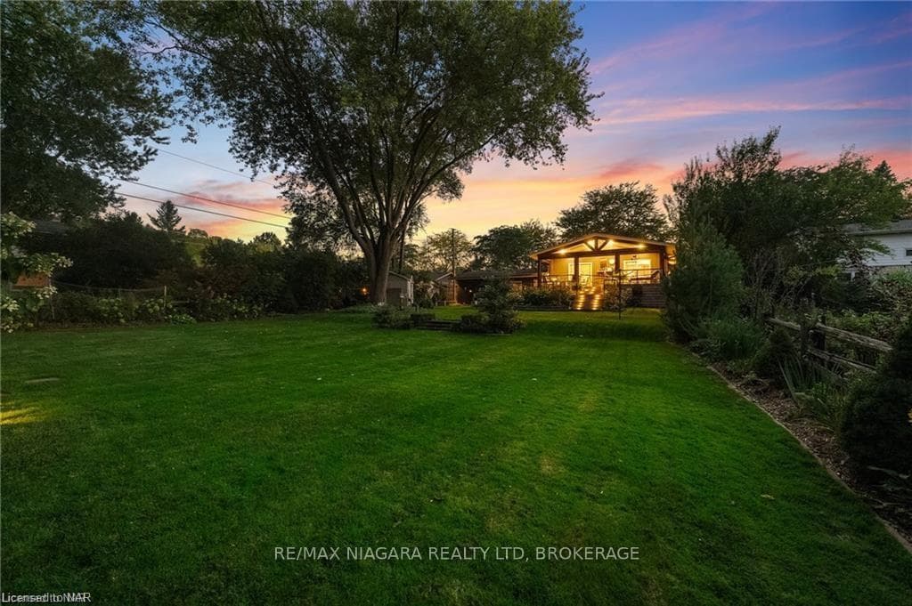 View of yard at dusk