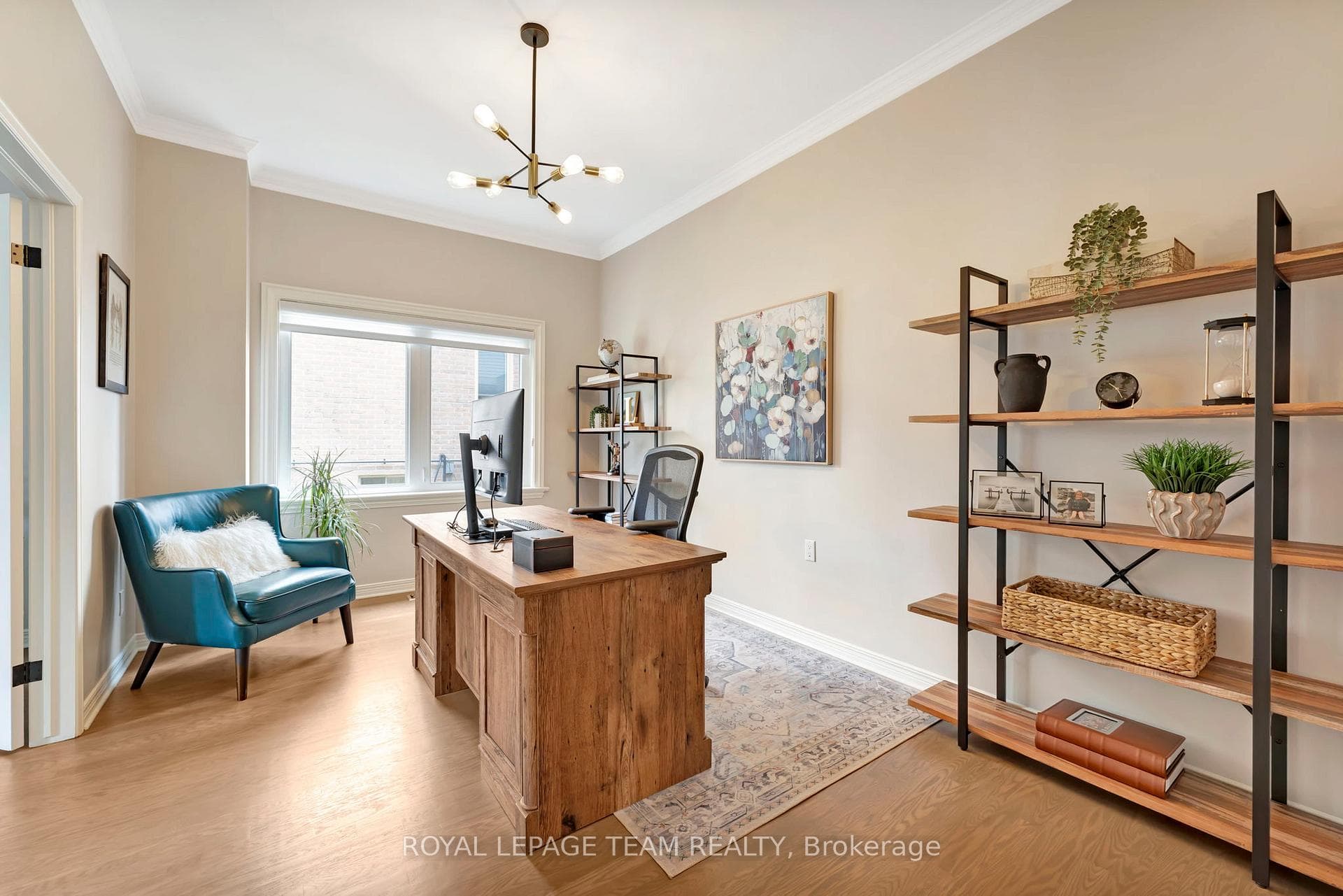 Main floor office, large window, hardwood floors