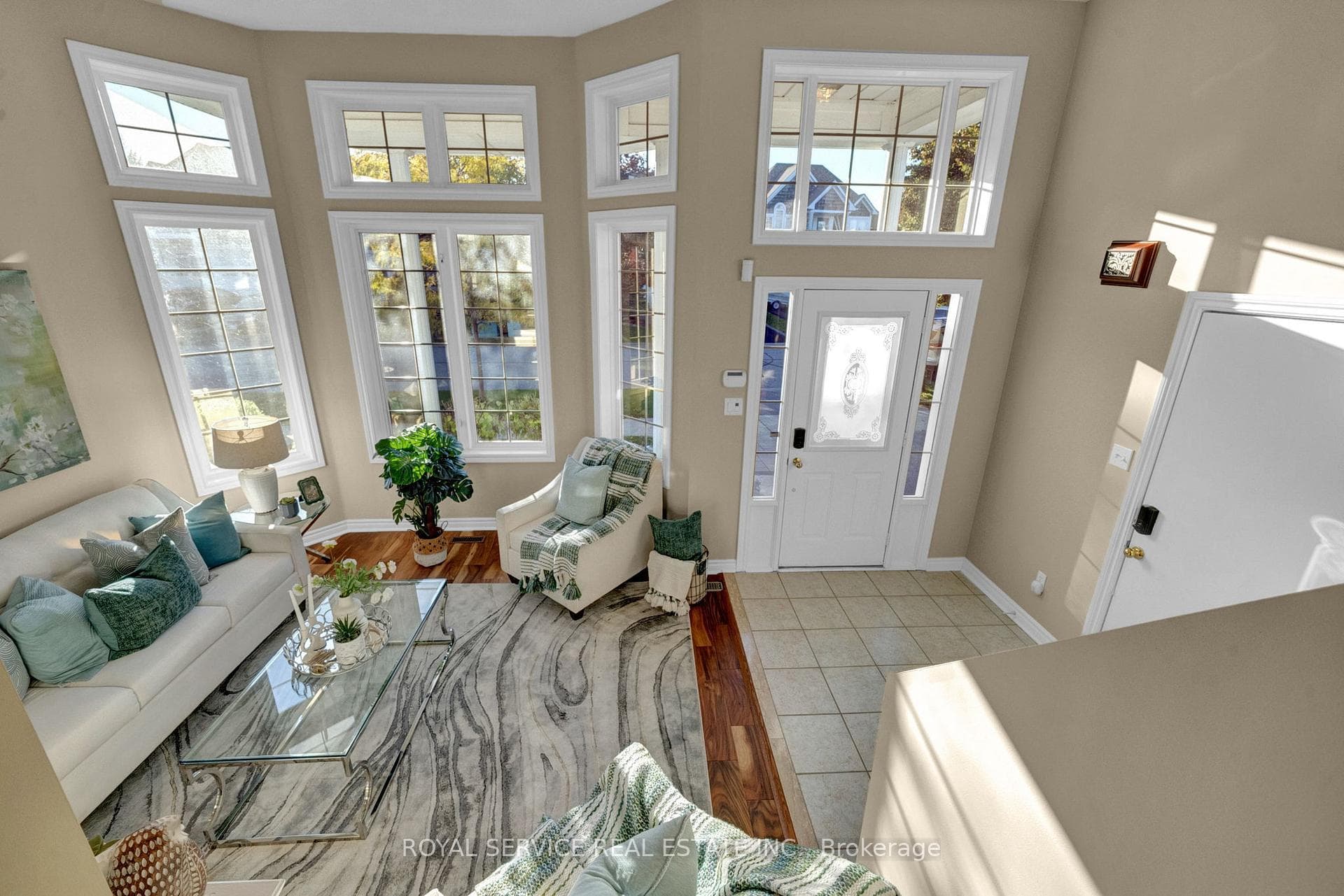 Soaring Ceilings in Foyer & Living Room
