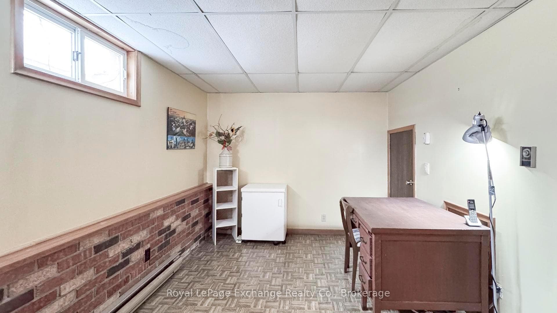 Basement family/rec room with propane fireplace.