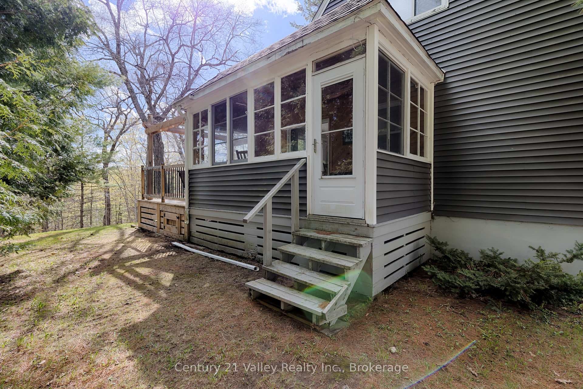 Side entrance to enclosed porch