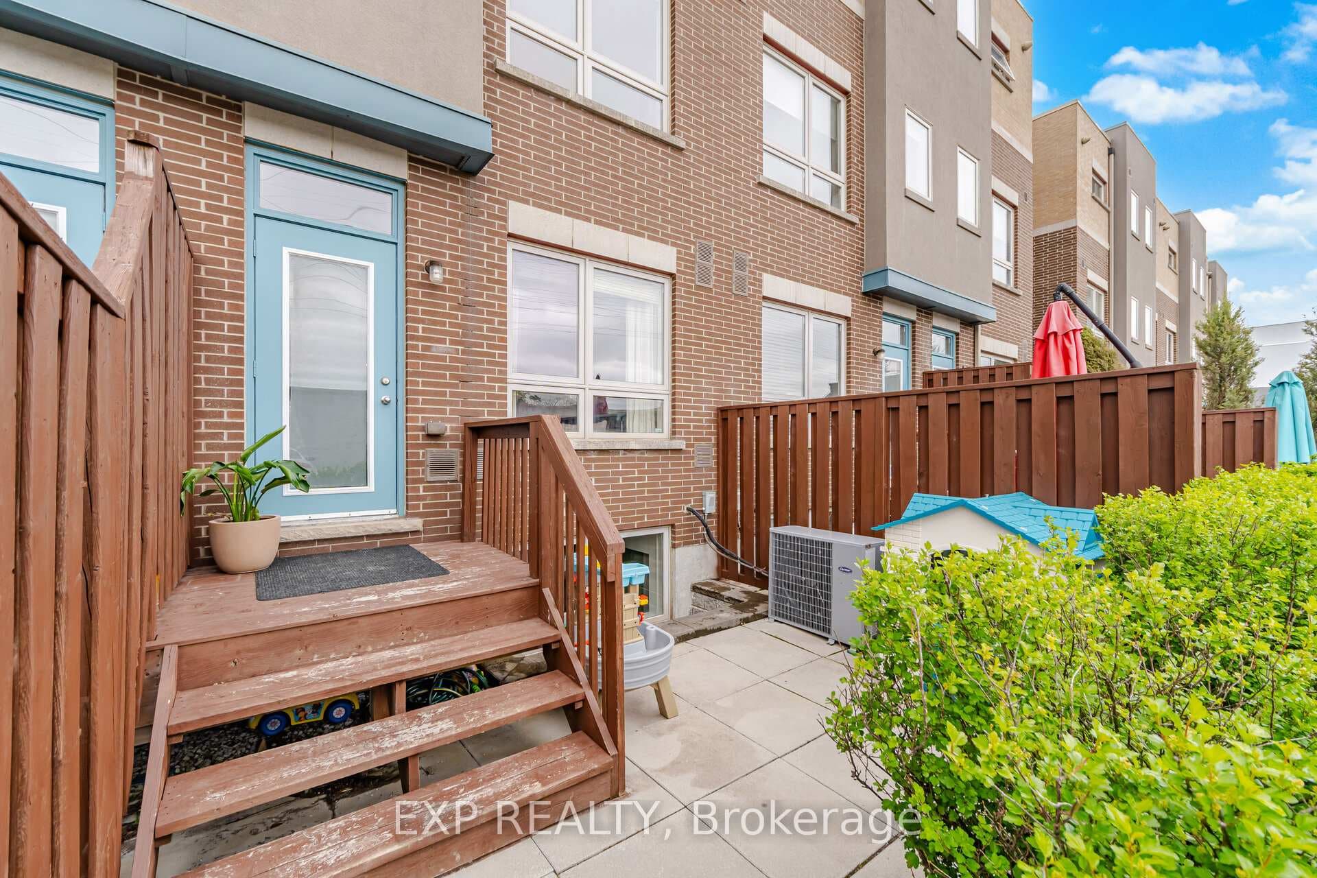 Backyard with back entry into home
