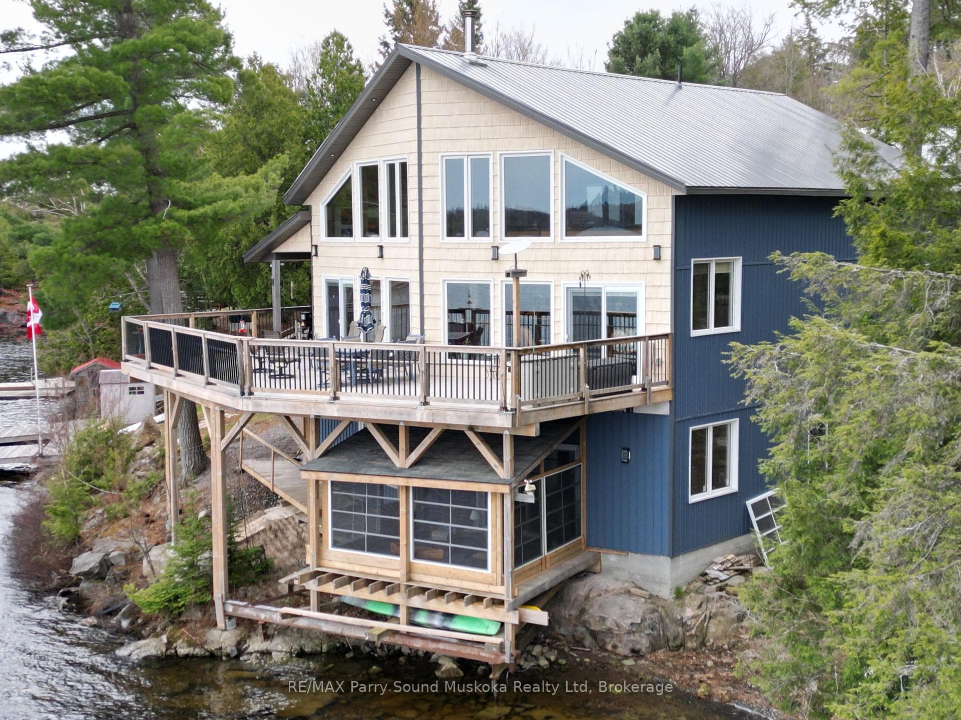 Main house with deck and three season room below