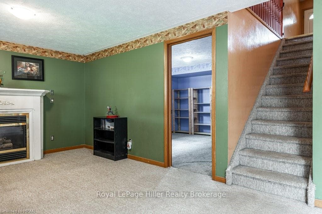 Unfurnished living room with a textured ceiling an