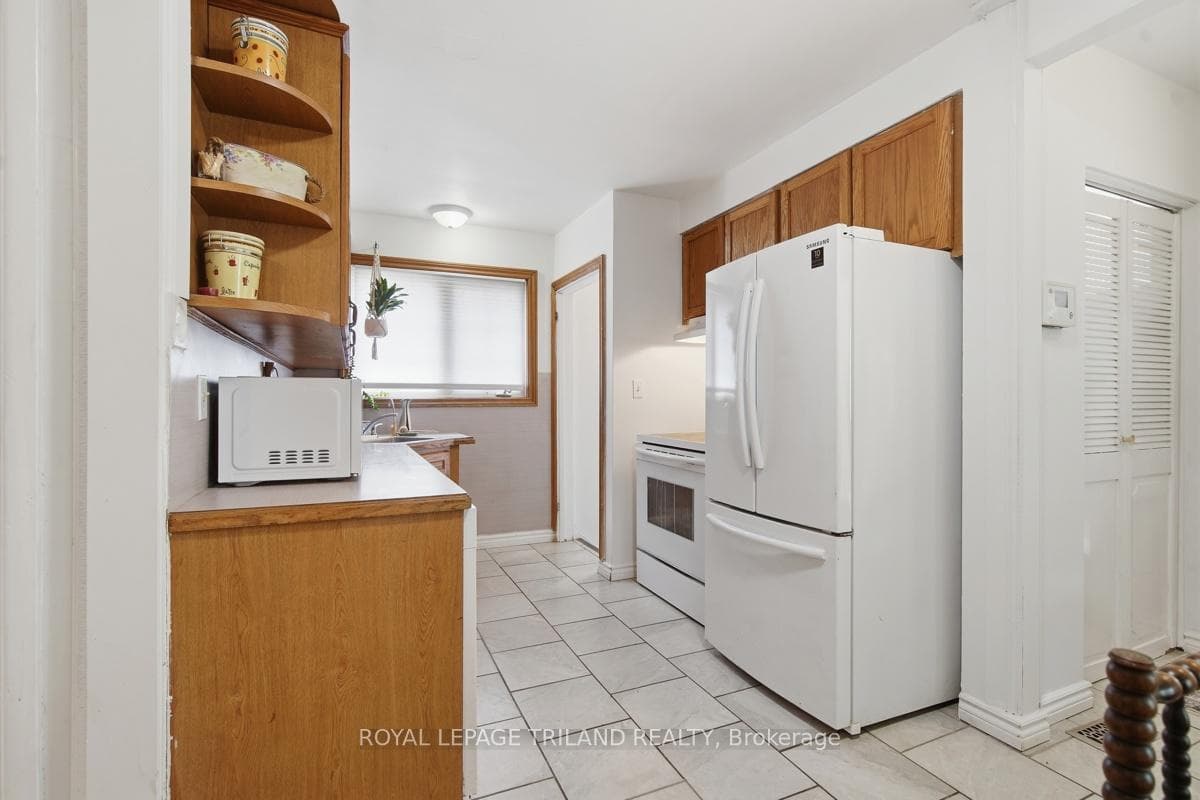 Large window into the kitchen as well