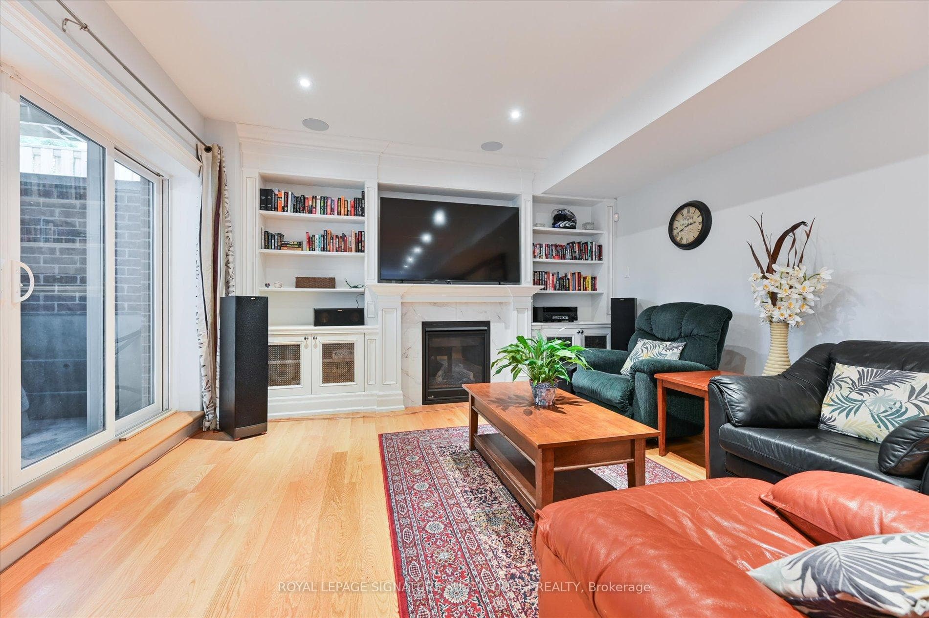 Lower level rec room with w/o, custom cabinetry