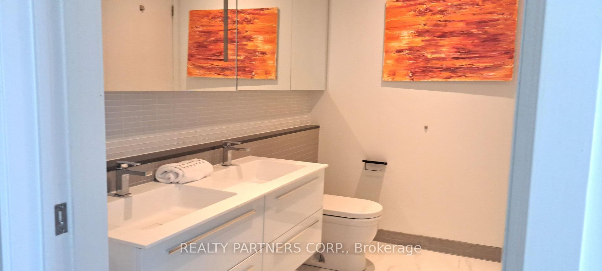 Primary bathroom double sinks and large shower