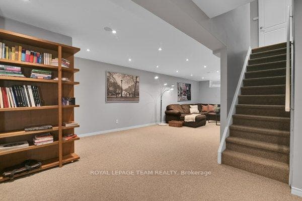 Lower level rec room with pot lights