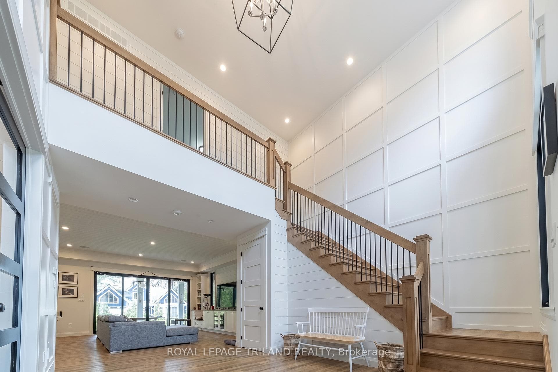 Soaring ceilings at entrance w/ coffered walls
