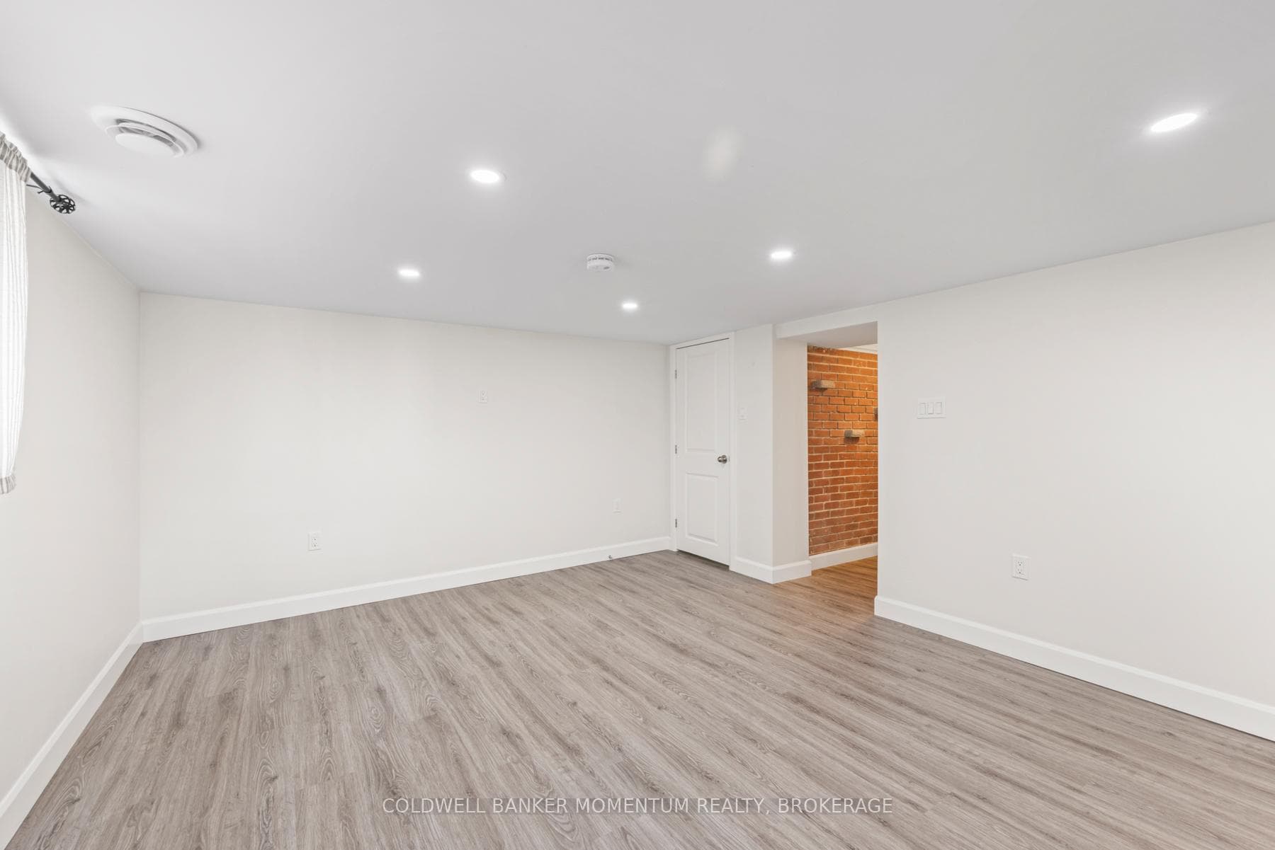 Large living area beside kitchen