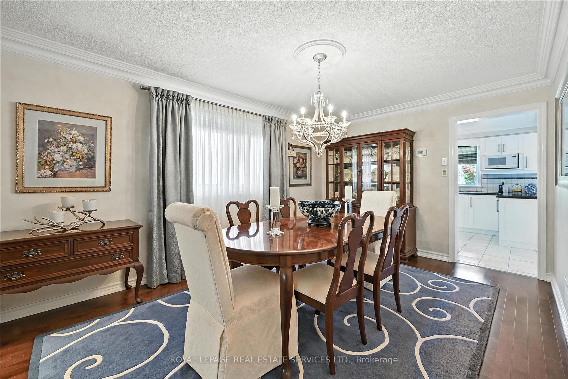 Dining Room Features Maple Hardwood Flooring
