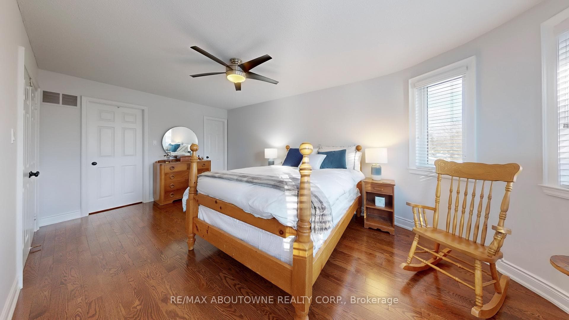 Primary Bdrm, Walk-in closet, fan and hardwoods