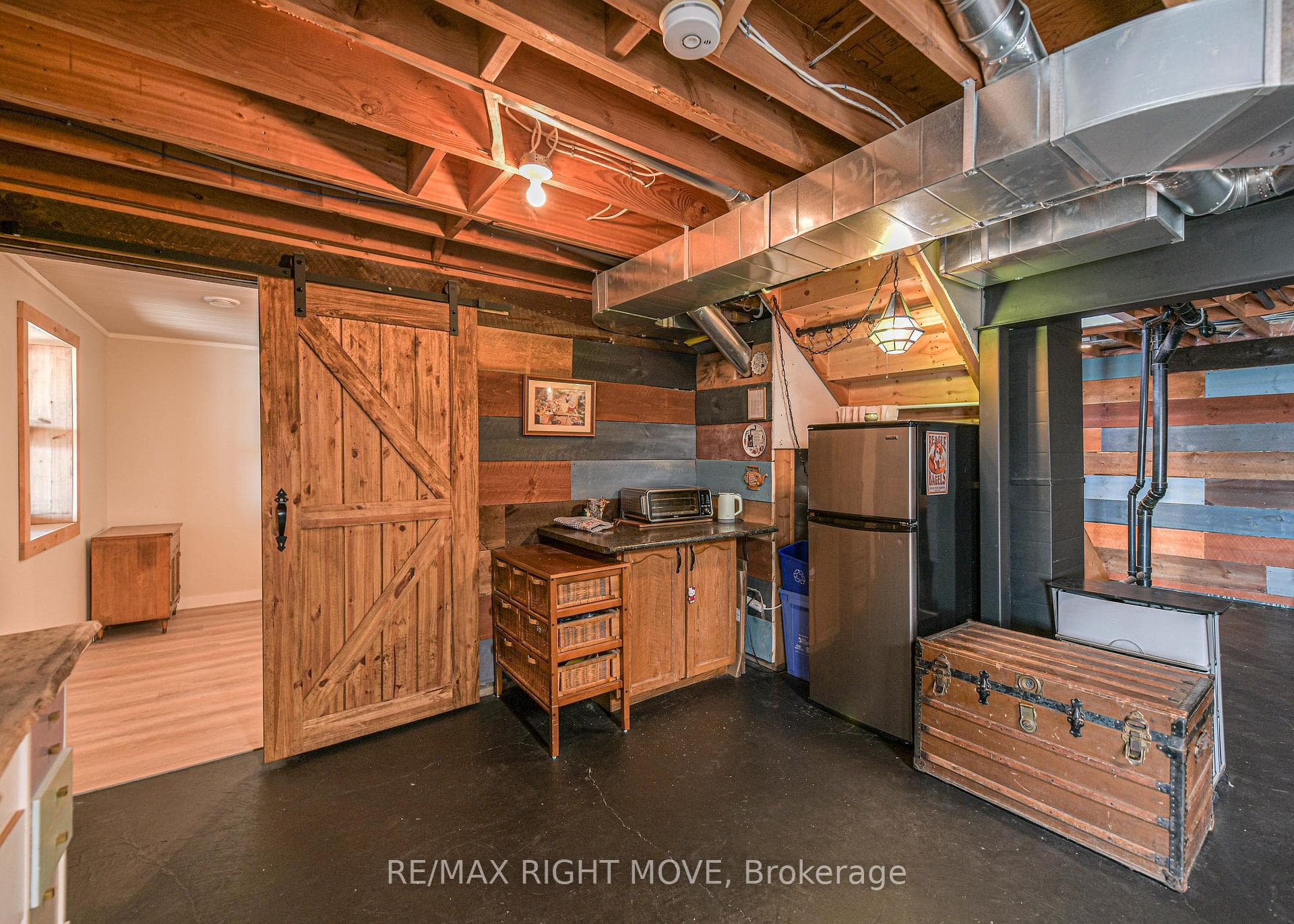 Sliding barn door leading to 3rd bedroom