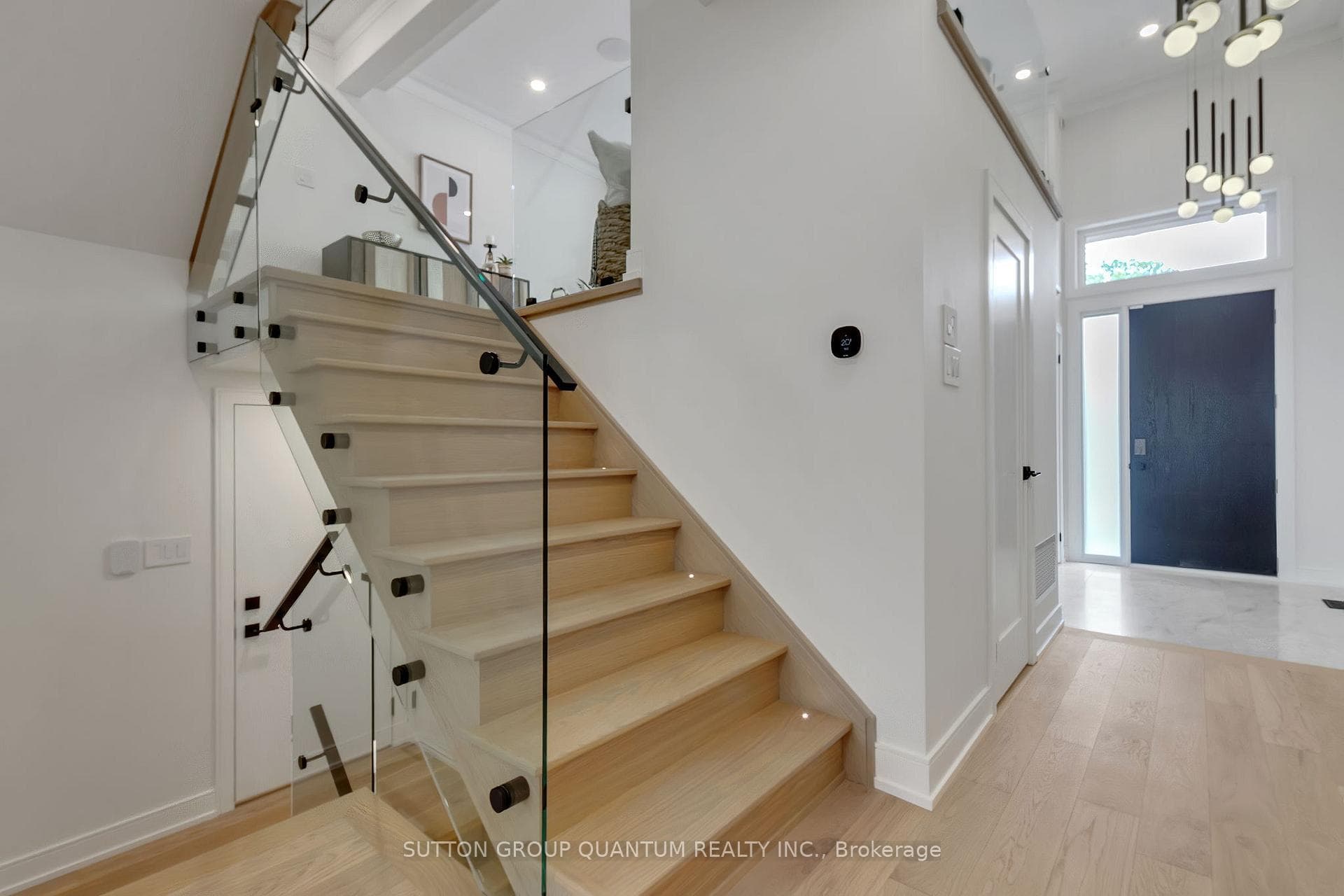 Open staircase and custom glass railings