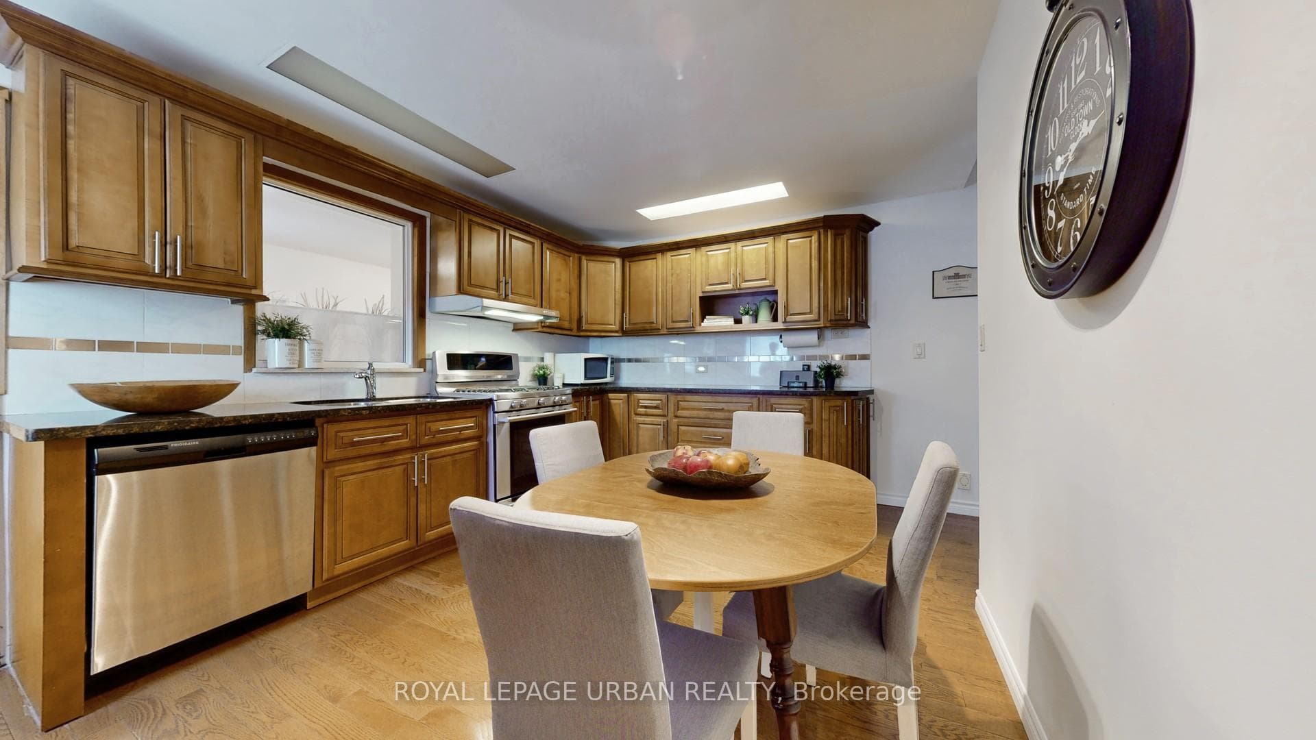 Granite Counters,Hardwood Floors + Tile Backsplash