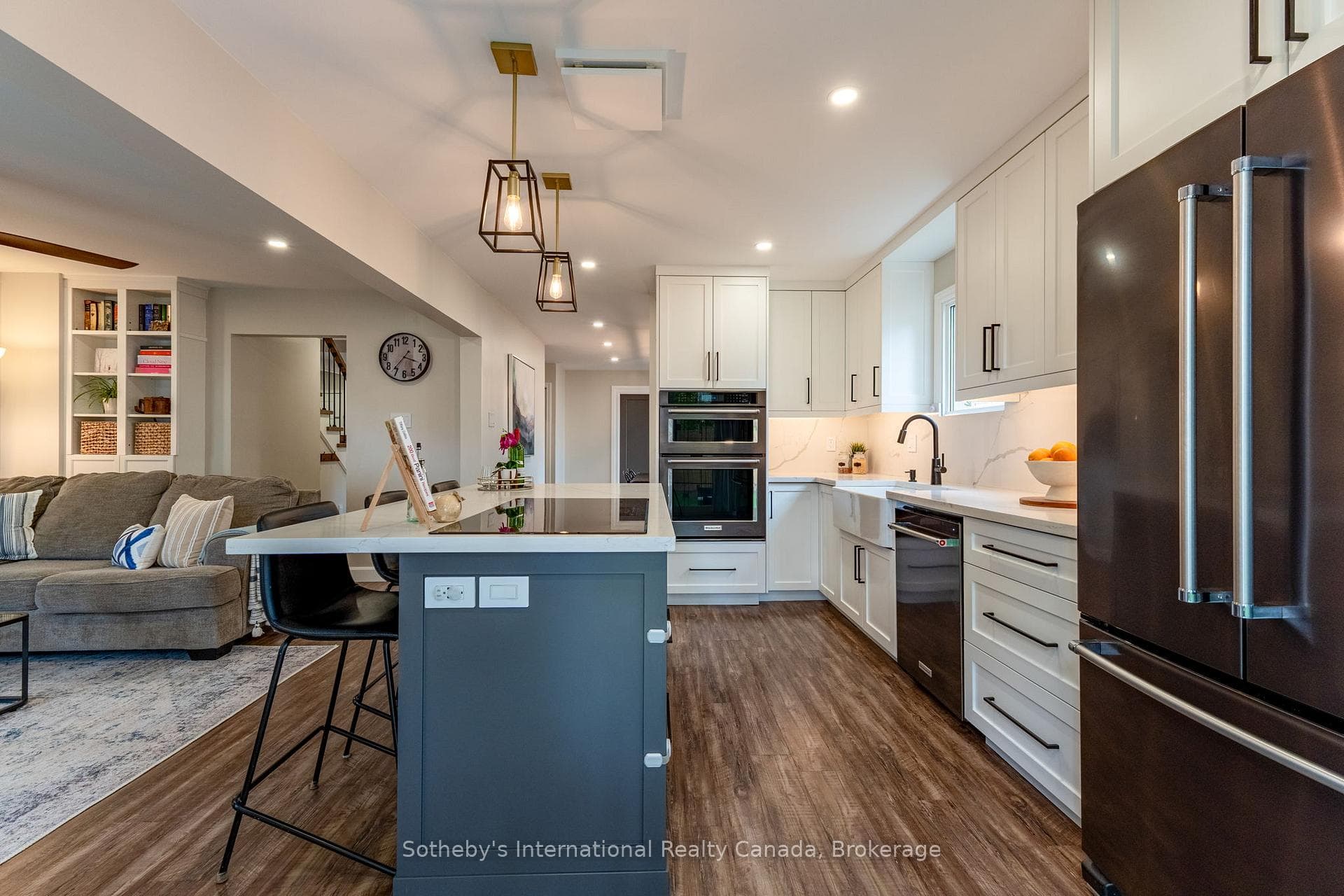 Chef's kitchen with built-in appliances.