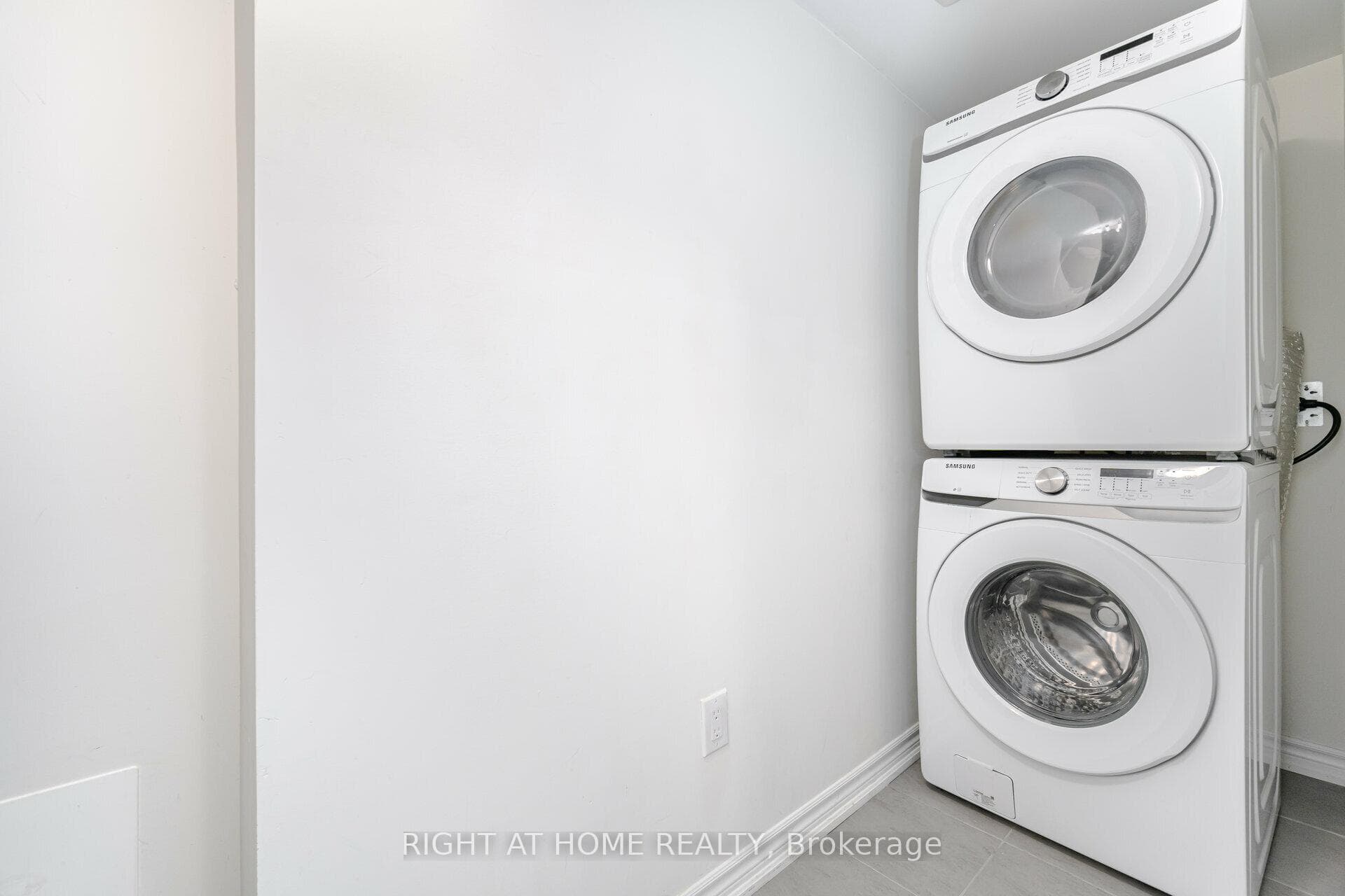 Laundry Room With Samsung Front Load Washer/Dryer
