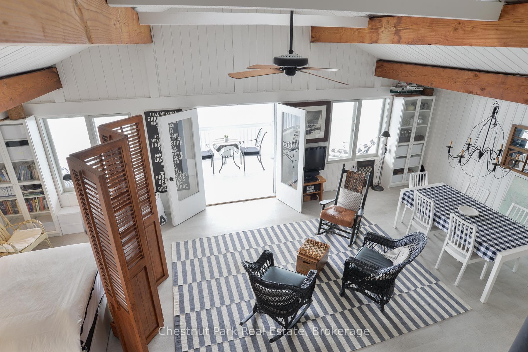 View from the Loft to Living Room & W-Out to Deck
