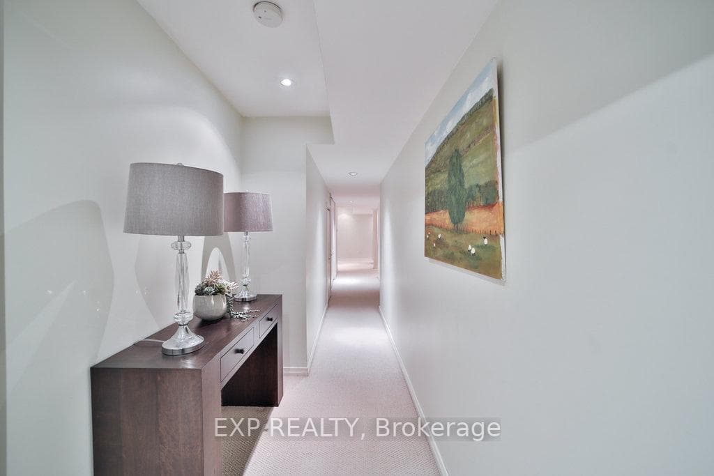 Hallway with laundry and plenty of storage
