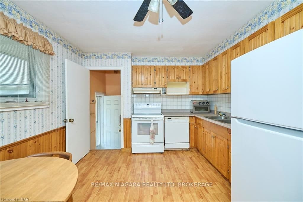 Spacious eat in Kitchen with fridge, stove with ho