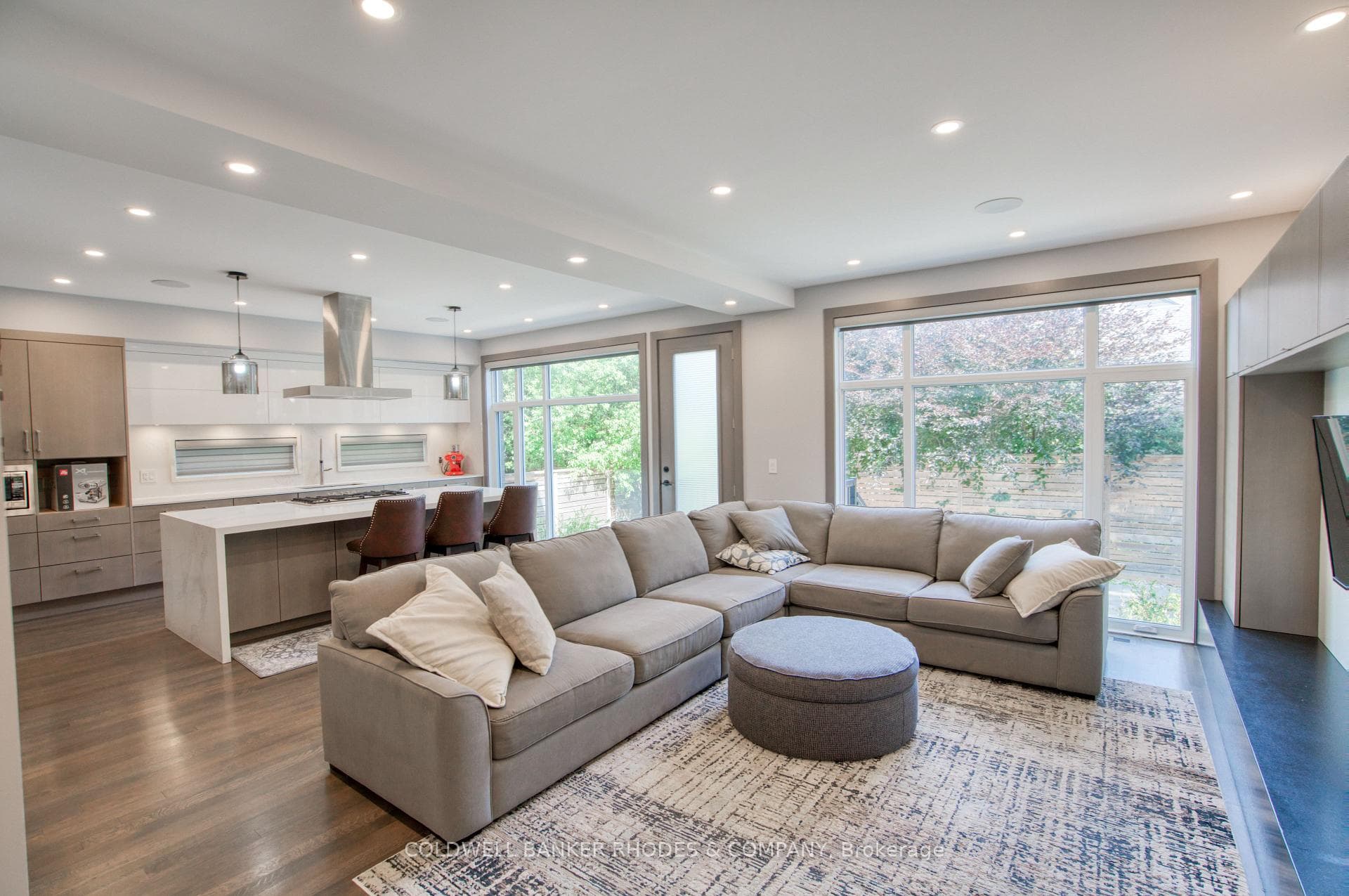 Family room is open to custom kitchen.