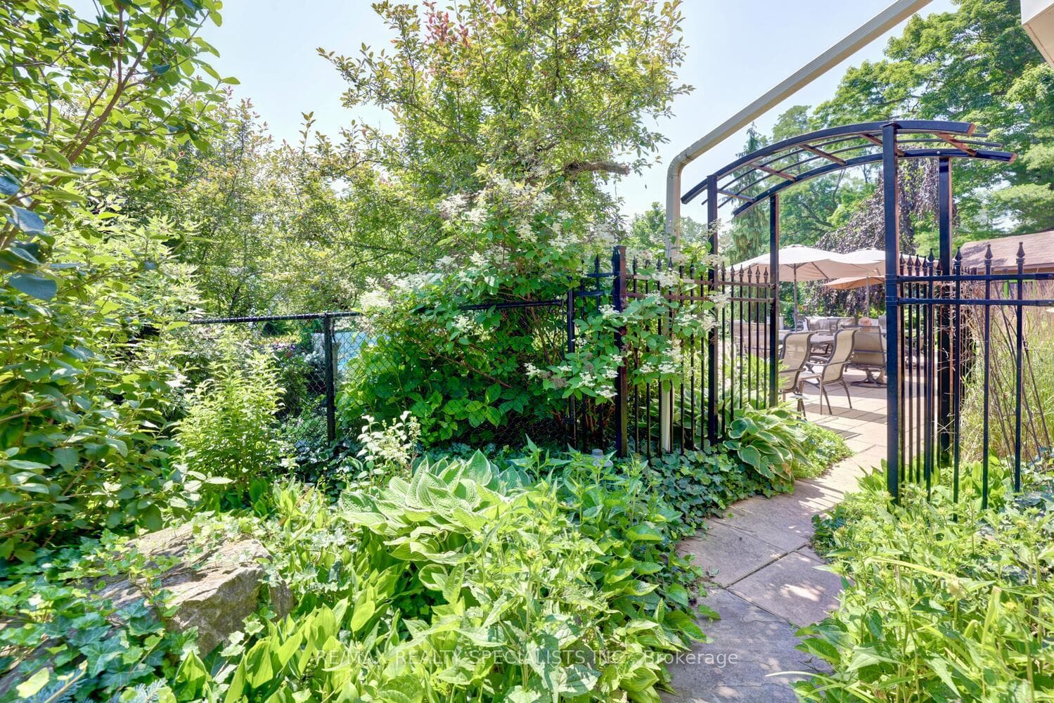 The pool is fenced and gated.