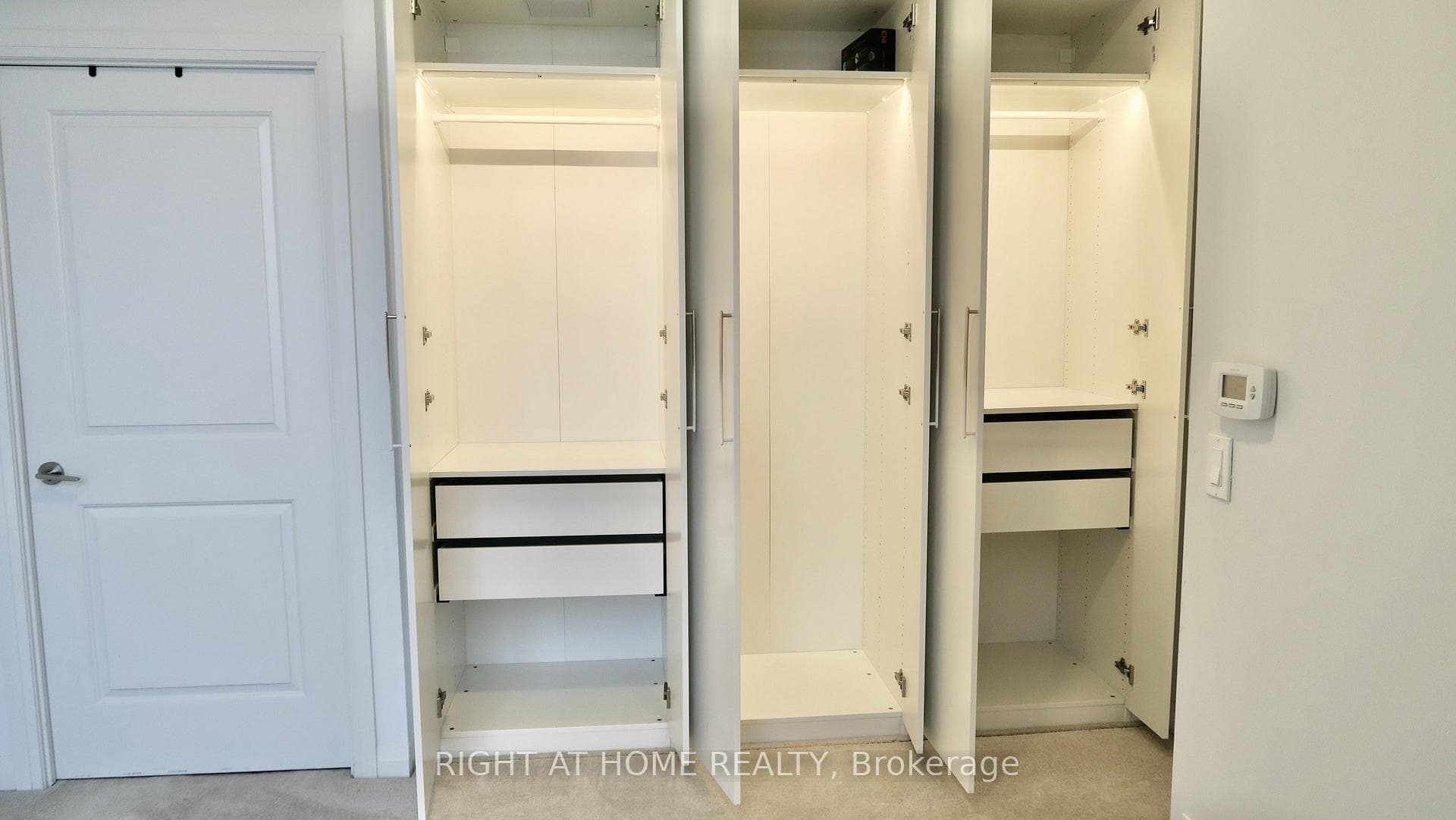Master Bedroom Illuminated Closet Organiser.