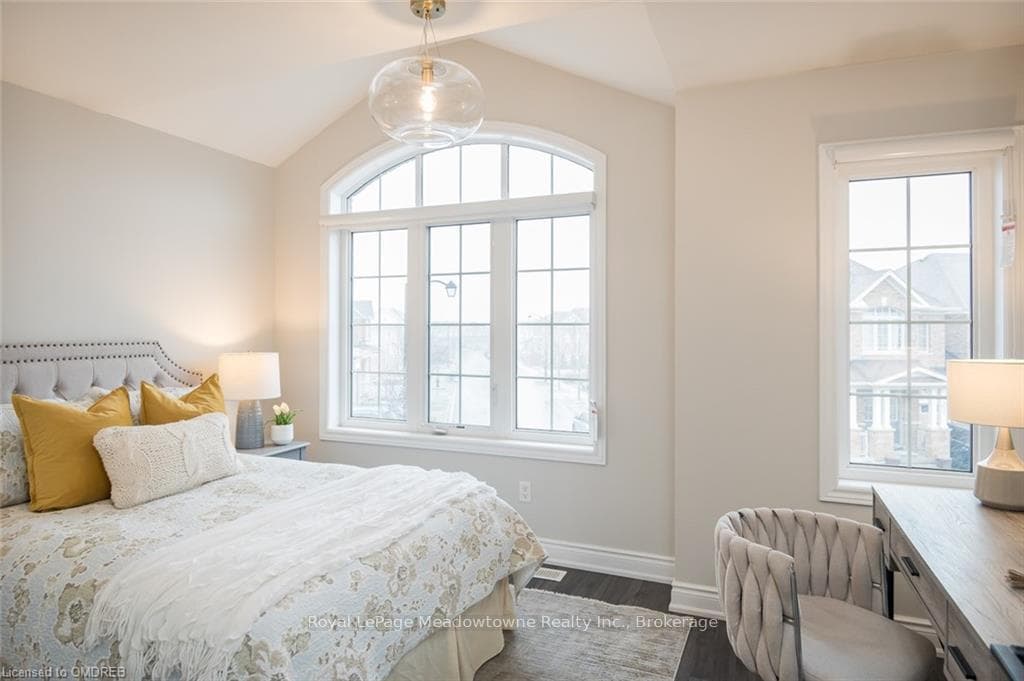 Bedroom with vaulted ceilings