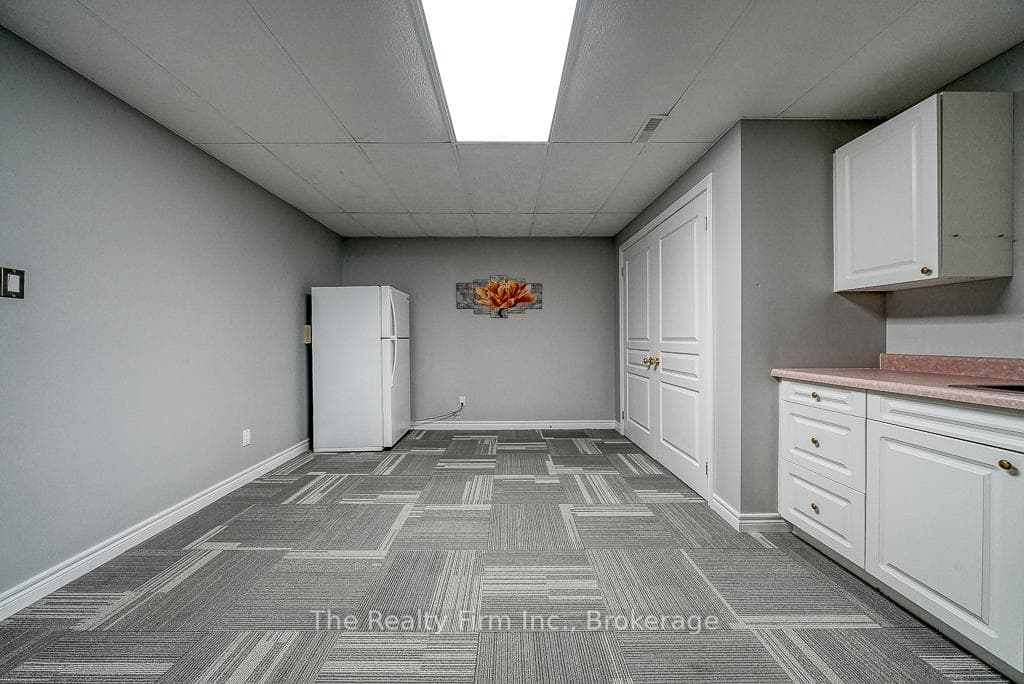Basement storage room with bar sink