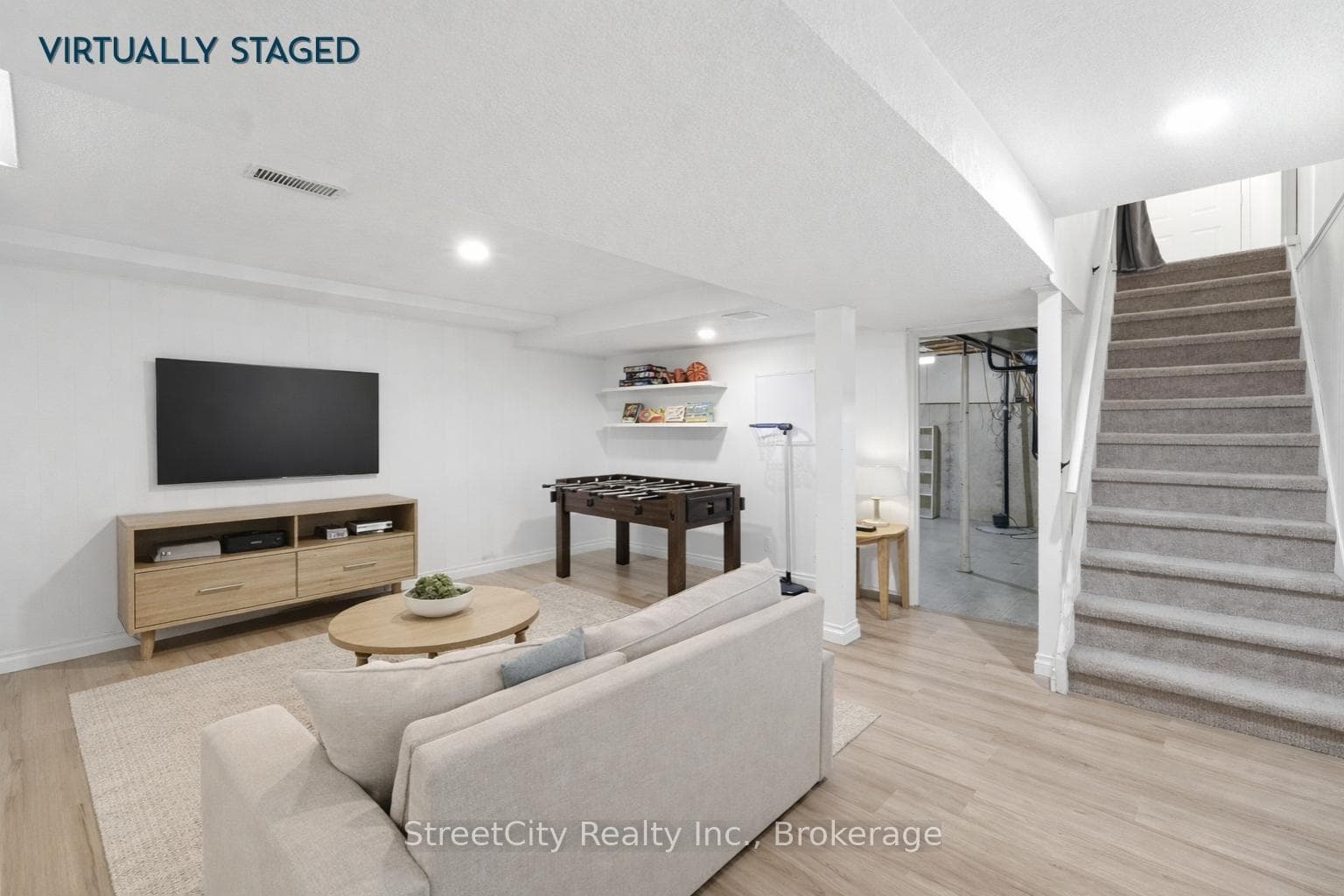 Basement rec room/office (virtually staged)