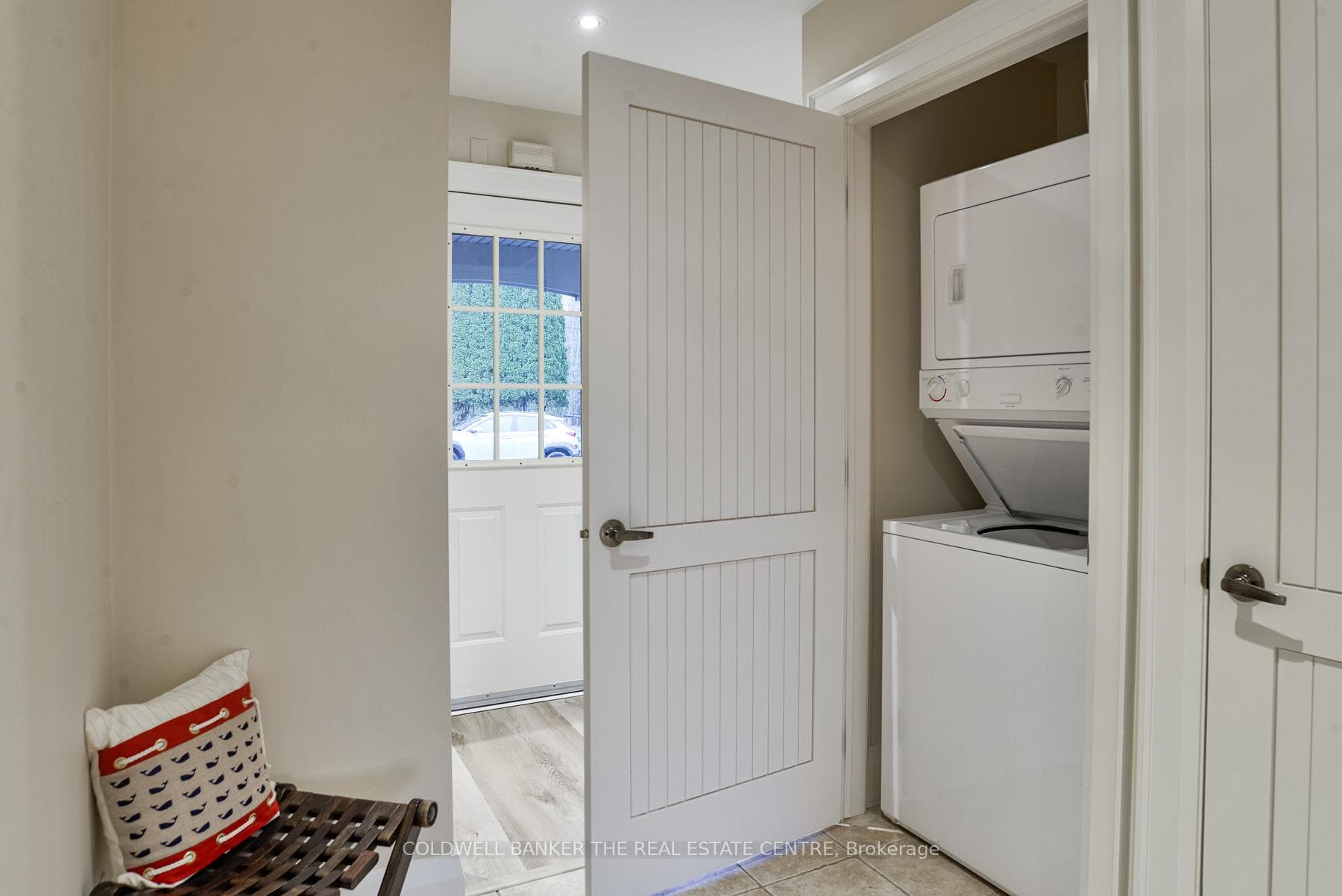 Laundry in 1/4 closets in large foyer