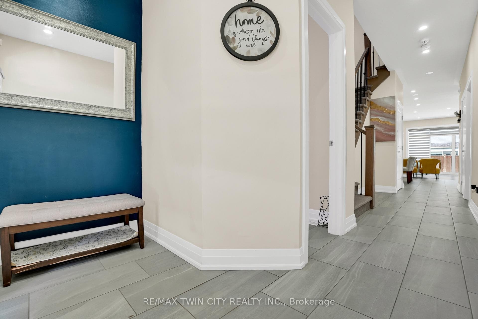 Hallway featuring large format tile flooring.