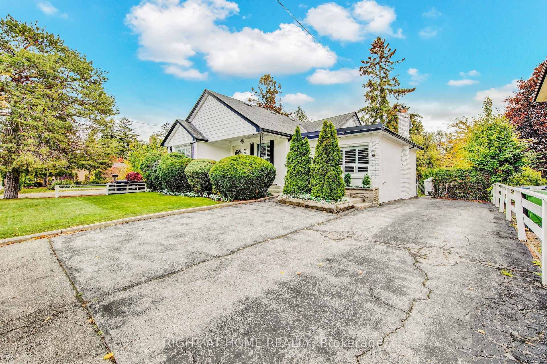 Large driveway accommodating up to six cars