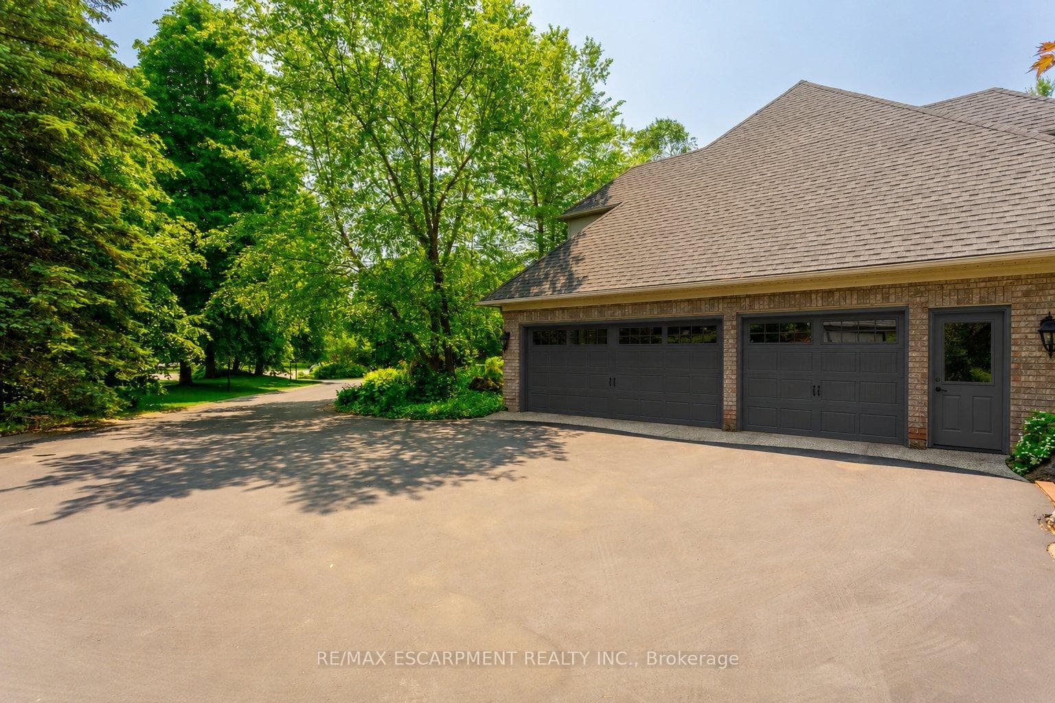 Spacious 3-car garage equipped with EV Charging.