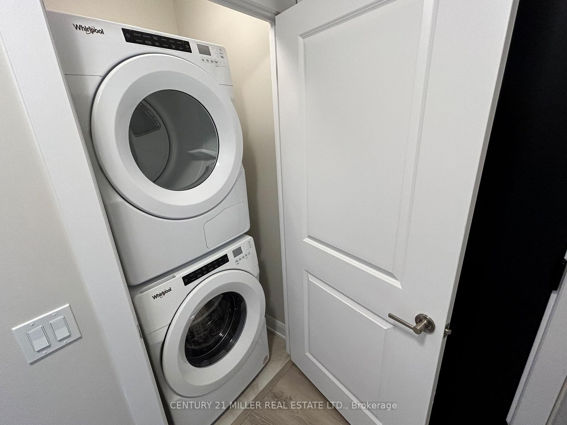 New Whirlpool stacked washer and dryer by entrance