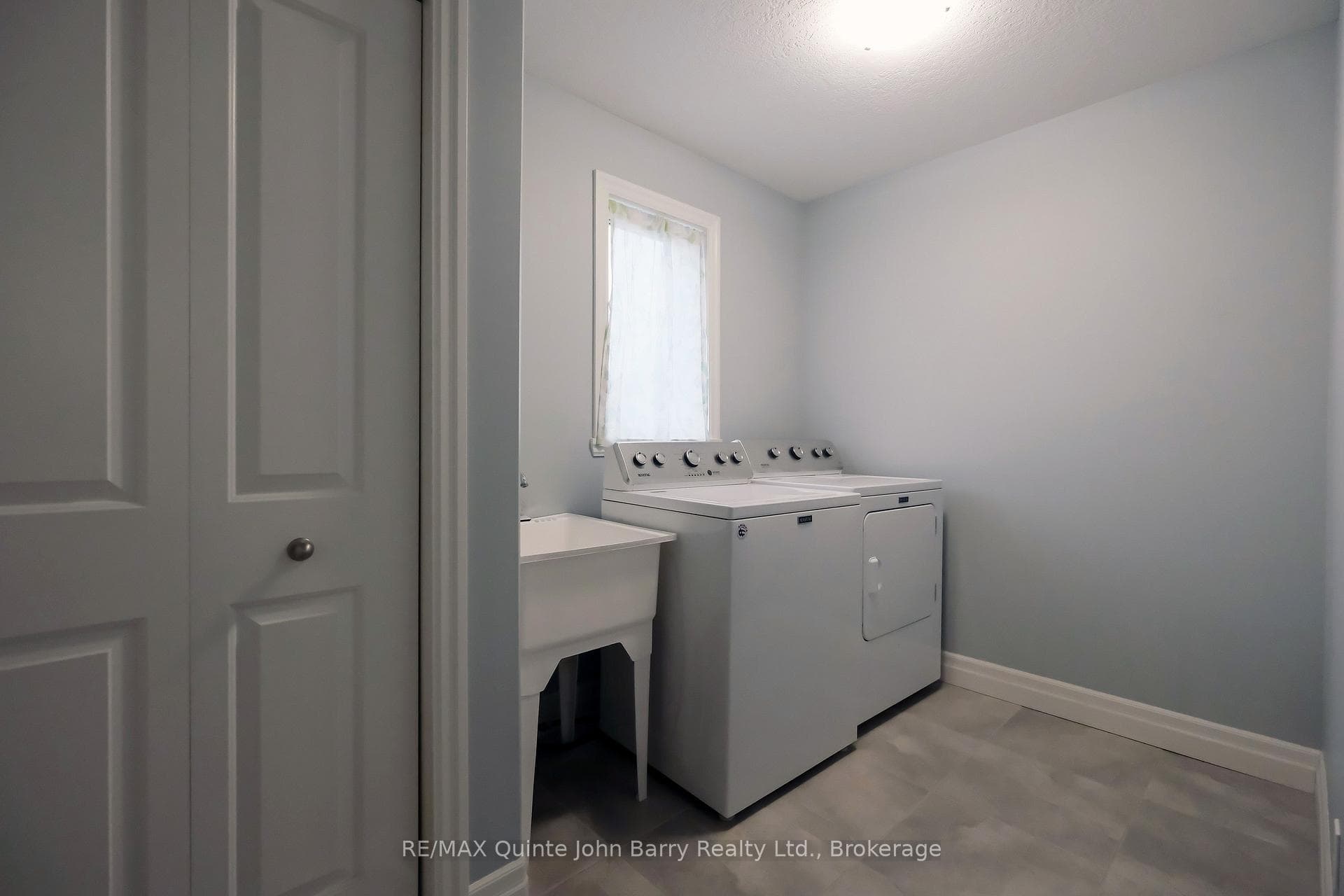 Laundy with Sink and Closet also access to Garage