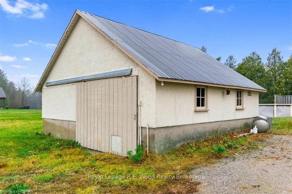 Garage with room for shop area.