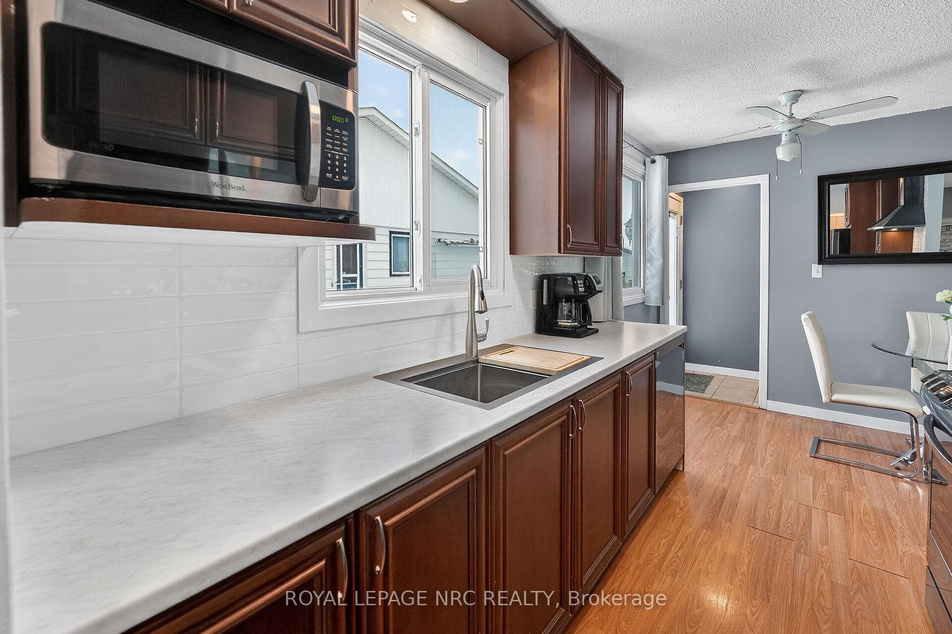 Newer kitchen, backsplash, dble sinks