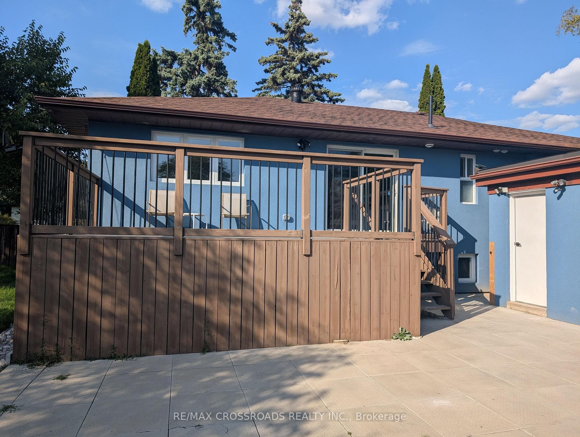 Large, open deck to relax, stairs to backyard