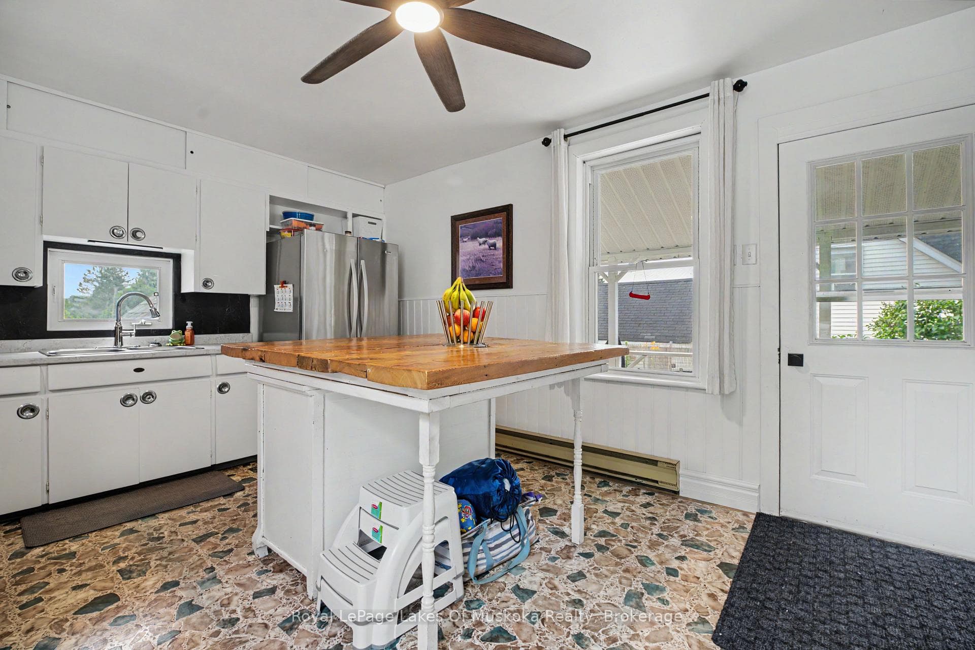 Kitchen, with walkout to the backyard