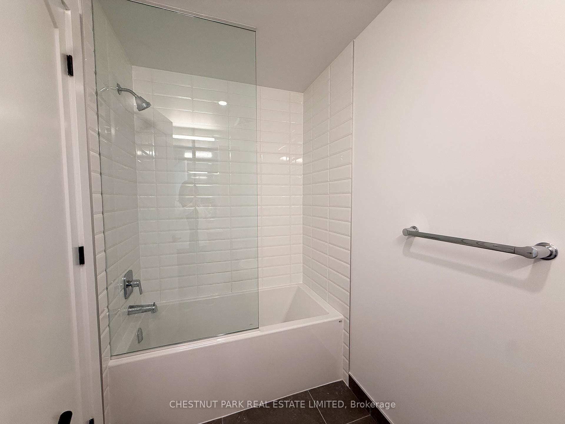 Main bathroom features shower & tub w glass encl.
